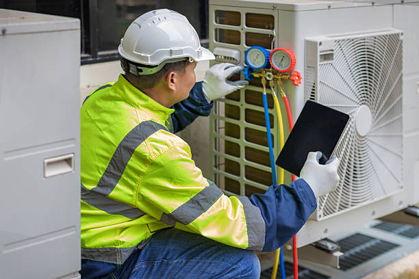 Professional Heat Pump Repair technician working in Wanatah, IN